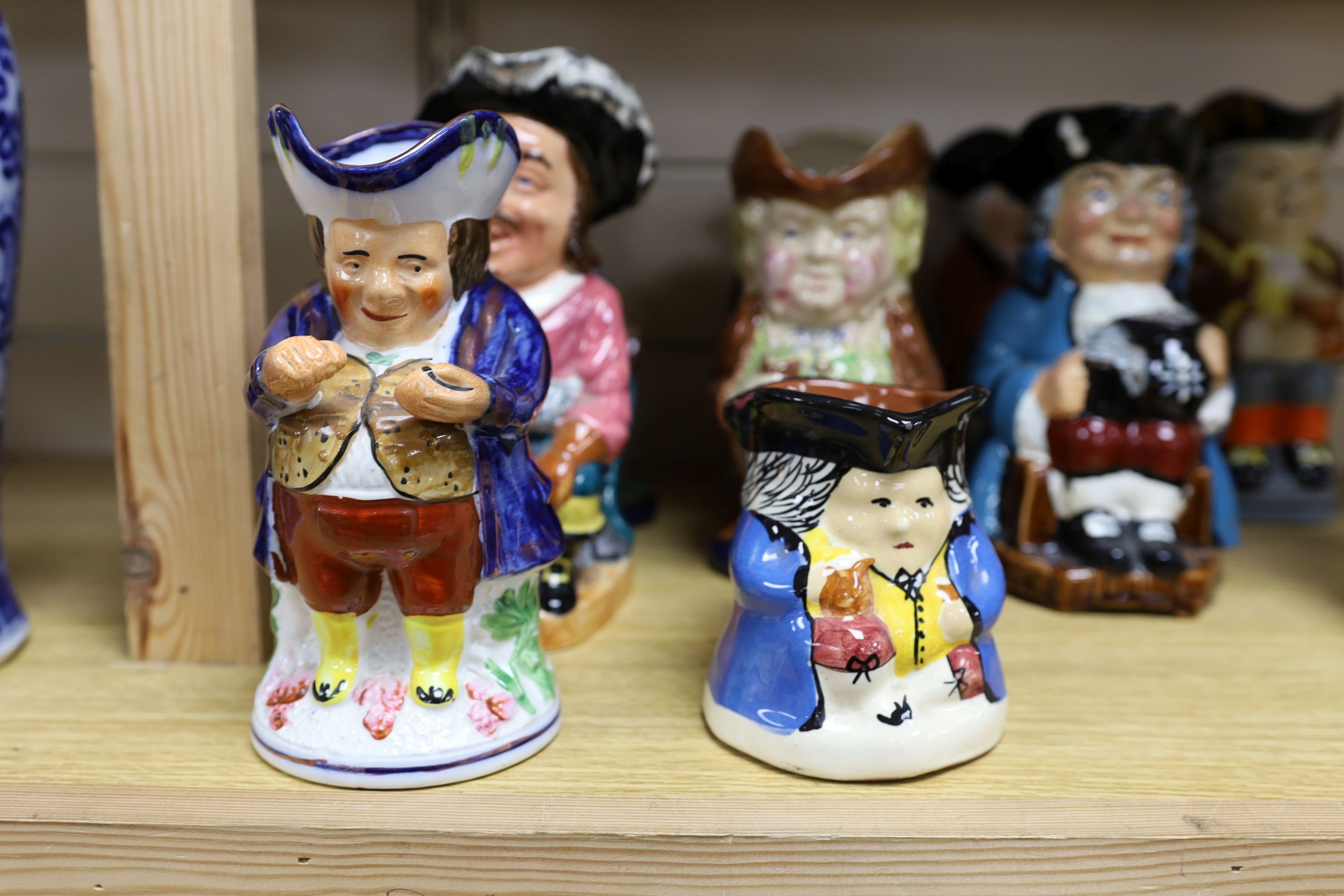 A Copeland Toby jug and twelve other Toby jugs